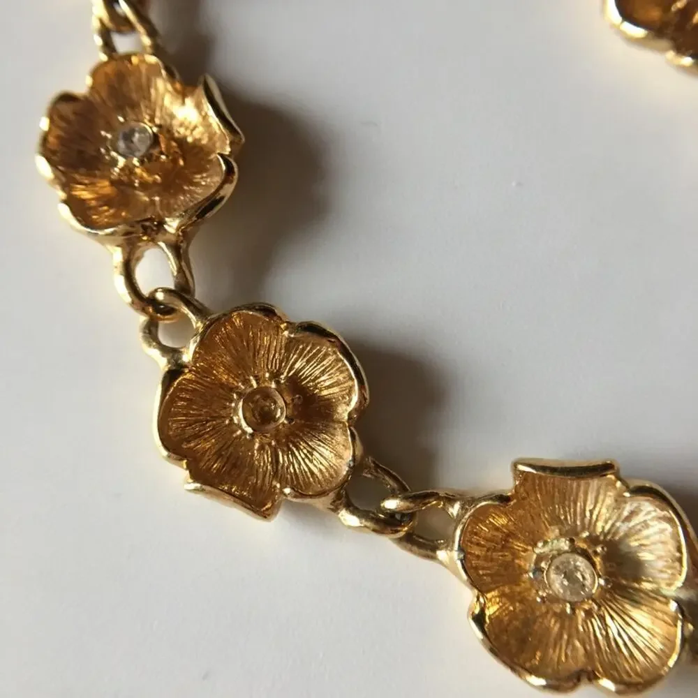 Vintage gold tone flower chain necklace with rhinestone accents